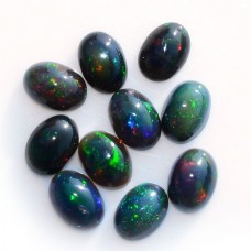 Black opal 7x5mm oval cabochon